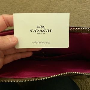 Coach brand purse.  C design with pink